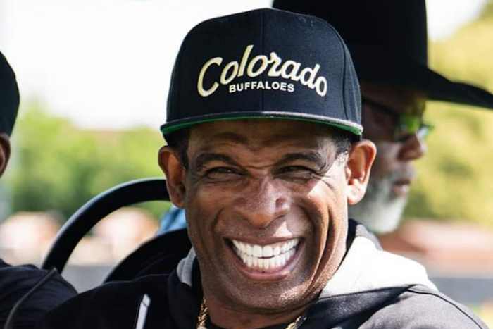 Deion Sanders smiling at CU Fall Camp